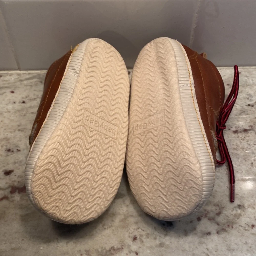 Baby Gap size 18-24 months brown bootie with Sherpa lining. Red laces. Like new